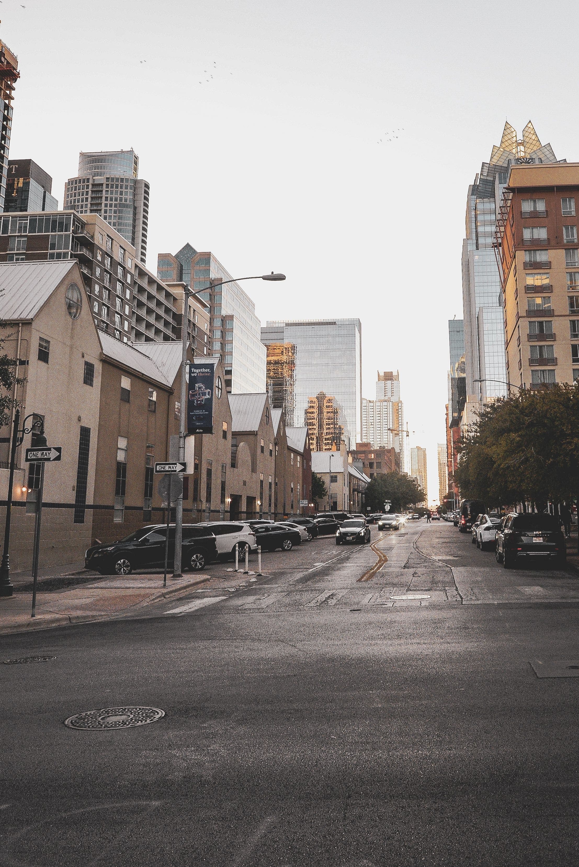 Downtown Austin, Texas street view with city skyline — real estate investment opportunities