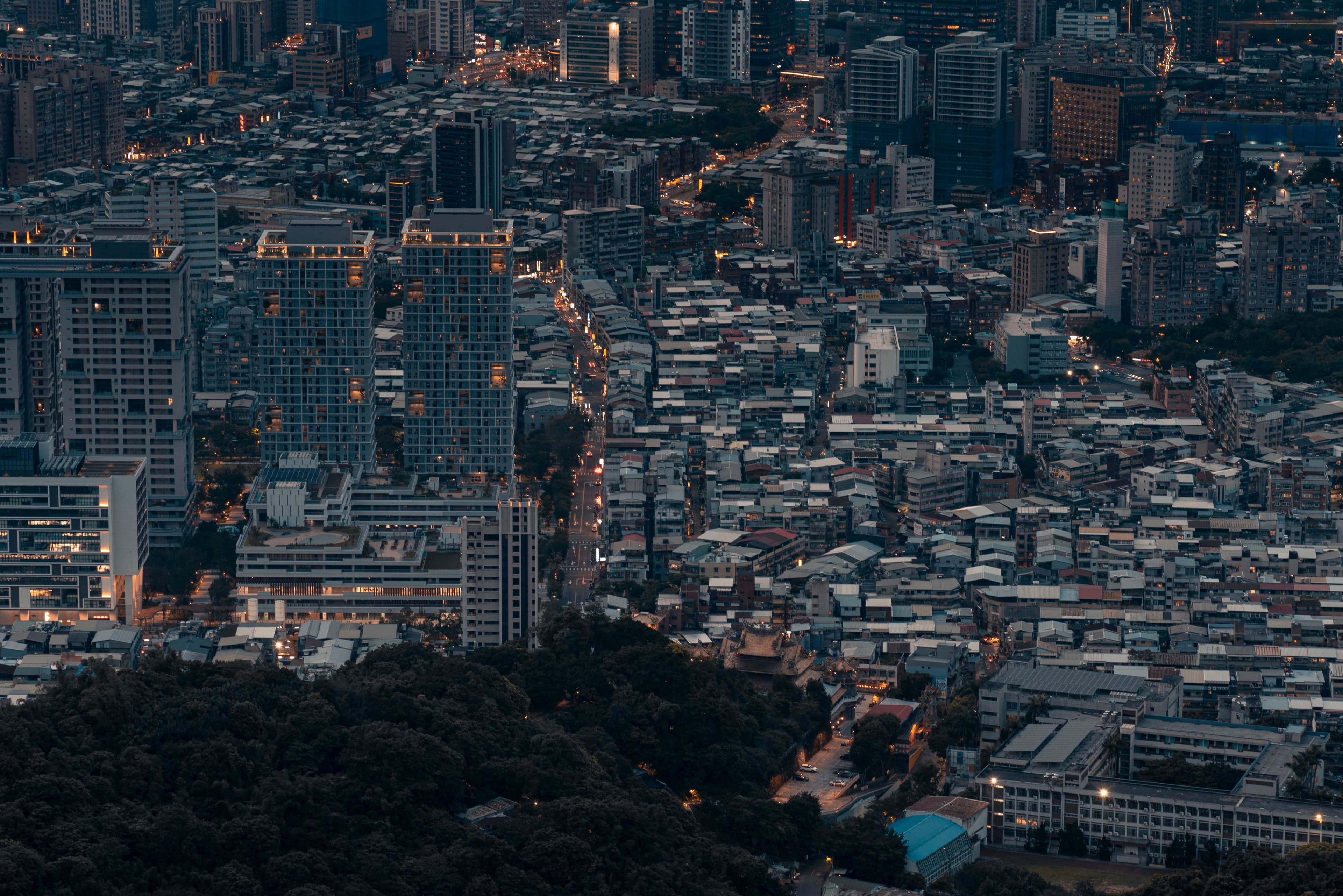 Aerial view of a dense urban cityscape representative of Selly's active markets