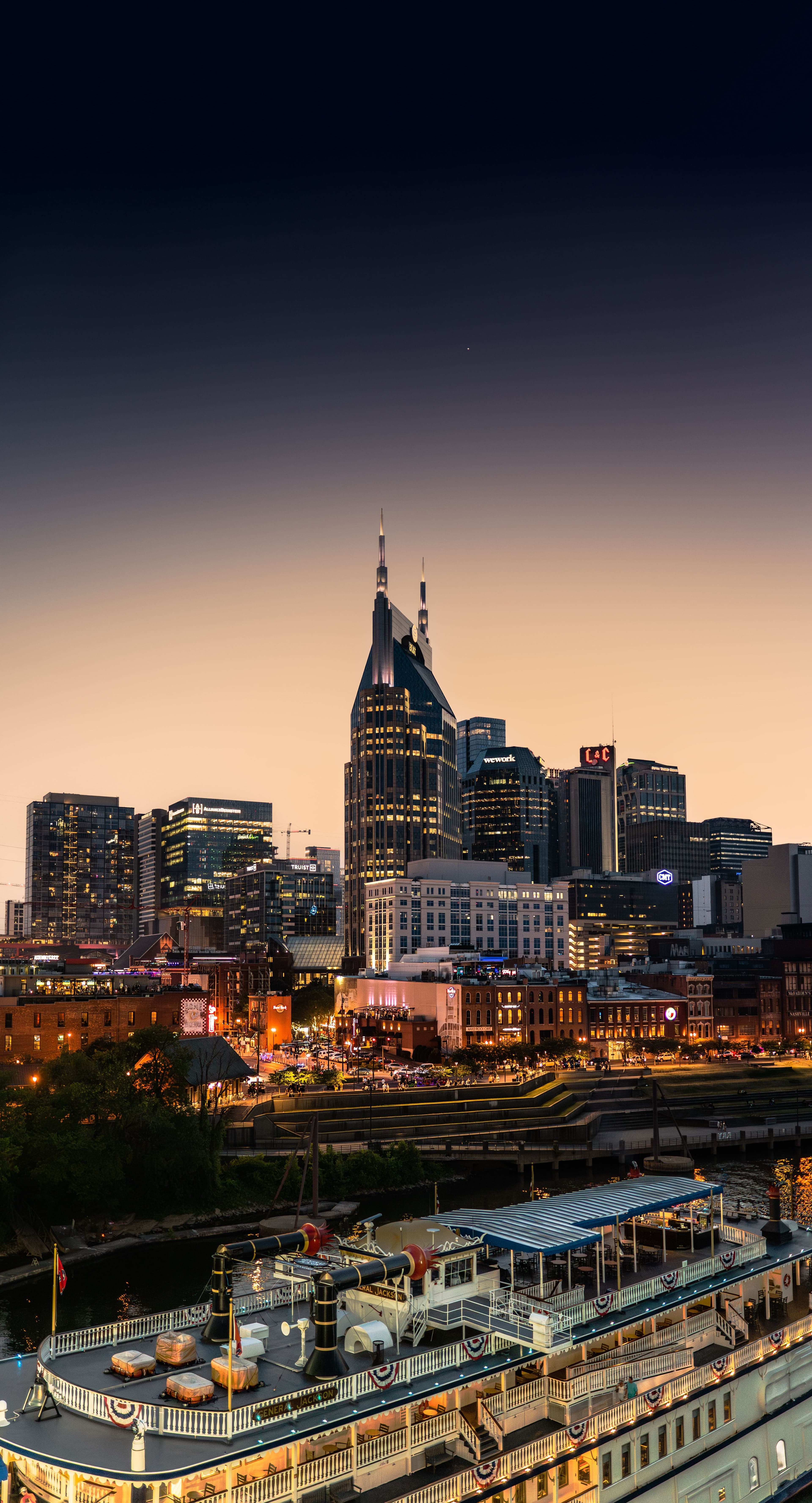 Nashville, Tennessee skyline at dusk from the riverfront — real estate investment opportunities
